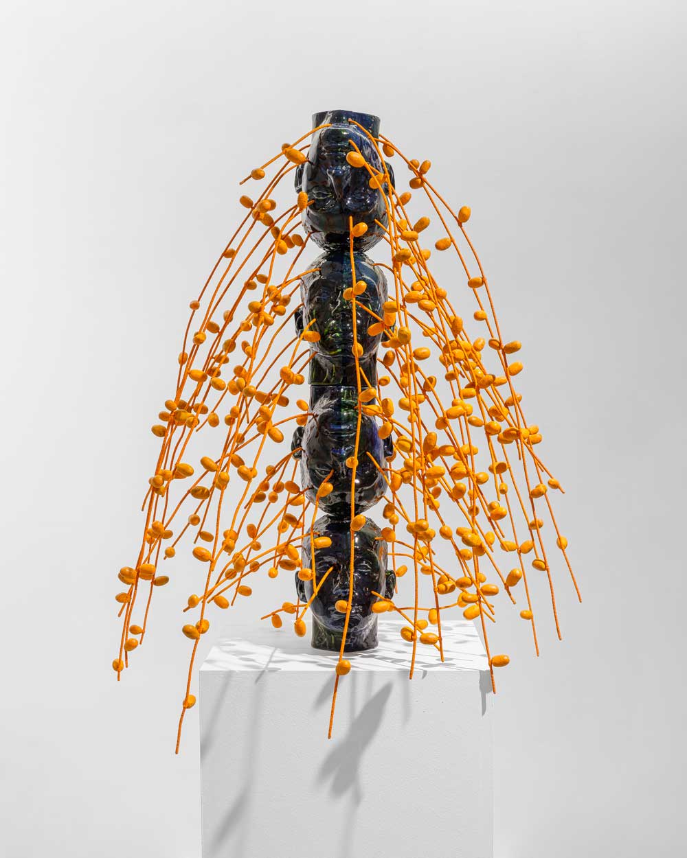 Mehdi-Georges-Lahlou-De-la-Conférence-des-Palmiers,-totem-dattier,-2025-Stoneware,-enamel,-oil-paint,-wool,-metal-Circa-90-x-70-x-70-cm_-COURTSEY-OF-LOFT-ART-GALLERY